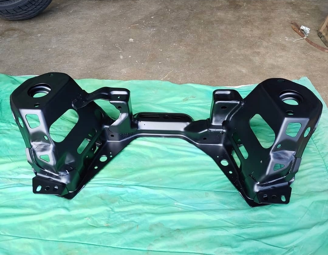 Powder coated black car frame after restoration