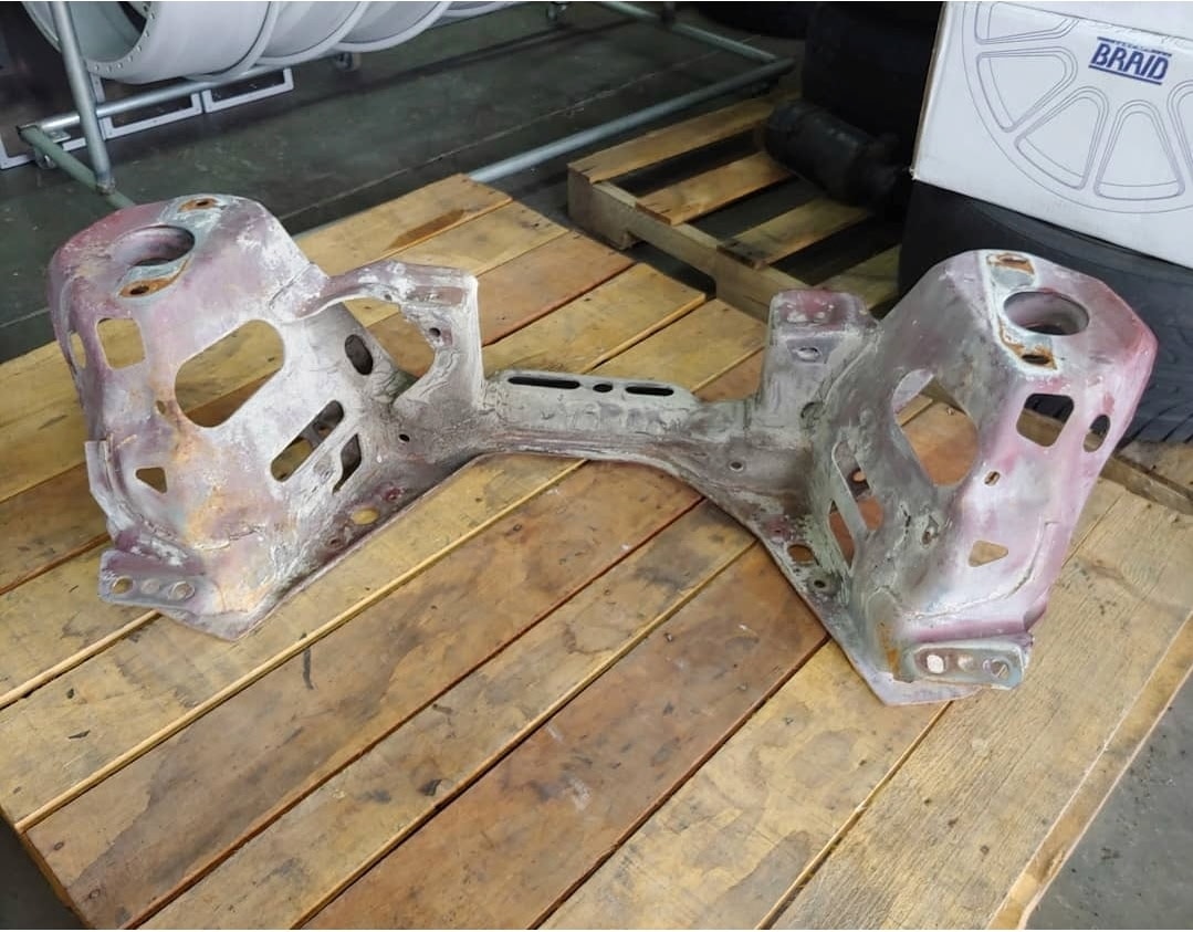 Rusty corroded car frame before powder coating